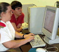 Mackenzie Corcoran and teammate work on their computer game.