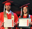 Photo of two Dec 2012 graduates