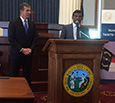 North Carolina Governor Roy Cooper with Infosys President and Chief Operating Officer Ravi Kumar