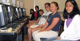 Photo of Girls on Track campers at their computers.