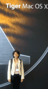 Photo of Neha Jain at the Tiger Mac OS X display.