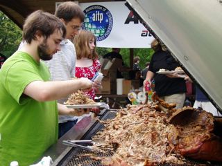 Photo of CSc students at Pig Pickin' celebration